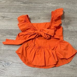Orange bow in back shirt